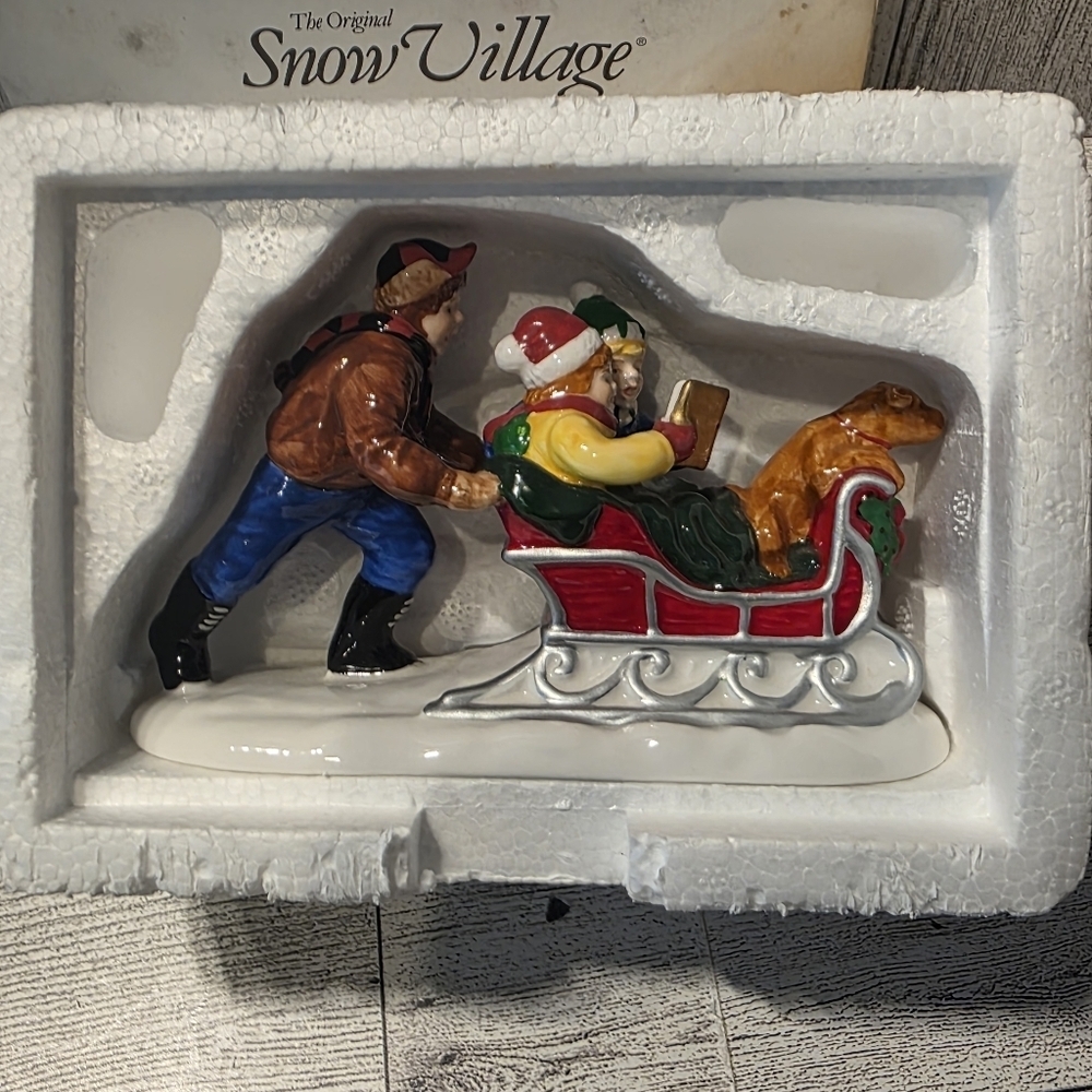 Department 56 Snow Village Santa Sleigh with Red and Green Accents